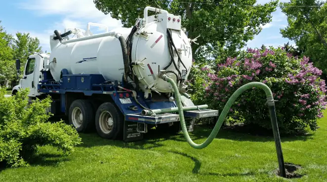 Professional vacuum truck performing residential drainage and septic maintenance in Yonkers, NY